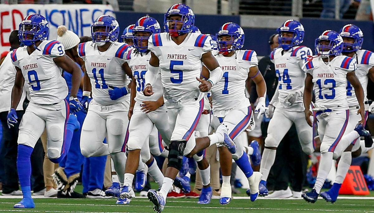 The Duncanville Panthers enter the field to face Flower Mound in the 6A Division I area round high school football playoff game at AT&T Stadium in Arlington, Tx Saturday November 23, 2019.