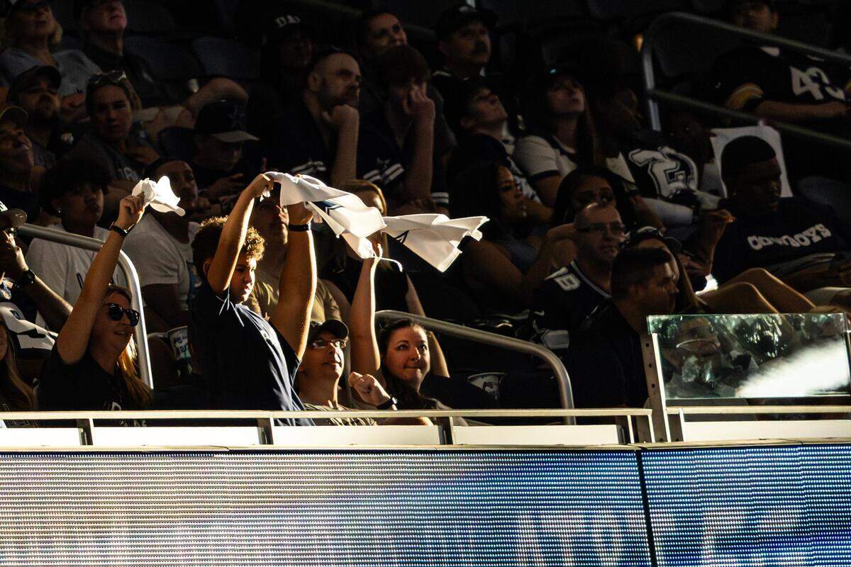 Young Cowboys fans cheer during the first preseason game between the Dallas Cowboys and Jacksonville Jaguars at AT&T Stadium in Arlington, Texas on Saturday, Aug. 12, 2023.