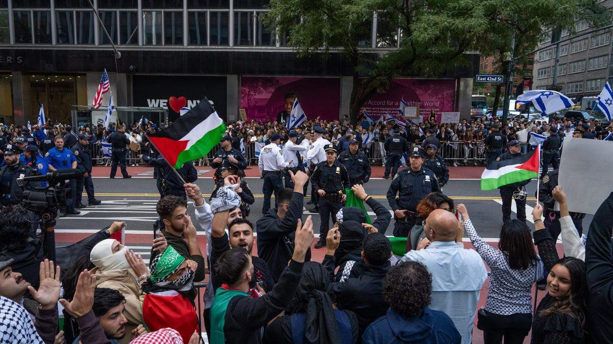 Opposing groups protest in support of Palestine and Israel near the Israeli consulate on Sunday, Oct. 8, 2023, in New York City. (Adam Gray/Getty Images/TNS)