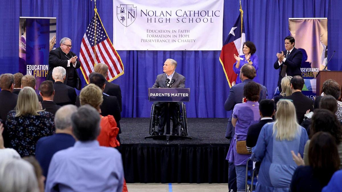 Gov. Greg Abbott receives a standing ovation after speaking at Nolan Catholic High School about his school choice plan on Wednesday, April 19, 2023. Senate Bill 8 would give families taxpayer money to pay for private schooling through an educational savings account