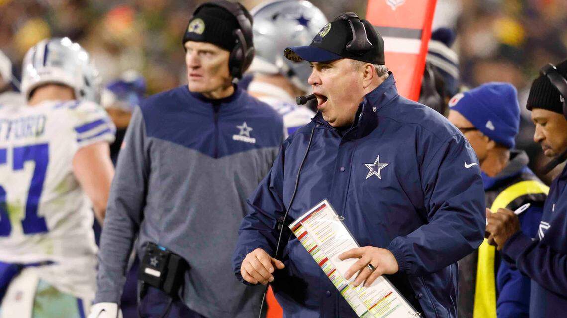 Dallas Cowboys coach Mike McCarthy, right, came up short in his return to Green Bay on Sunday as the Packers won 31-28 in overtime.