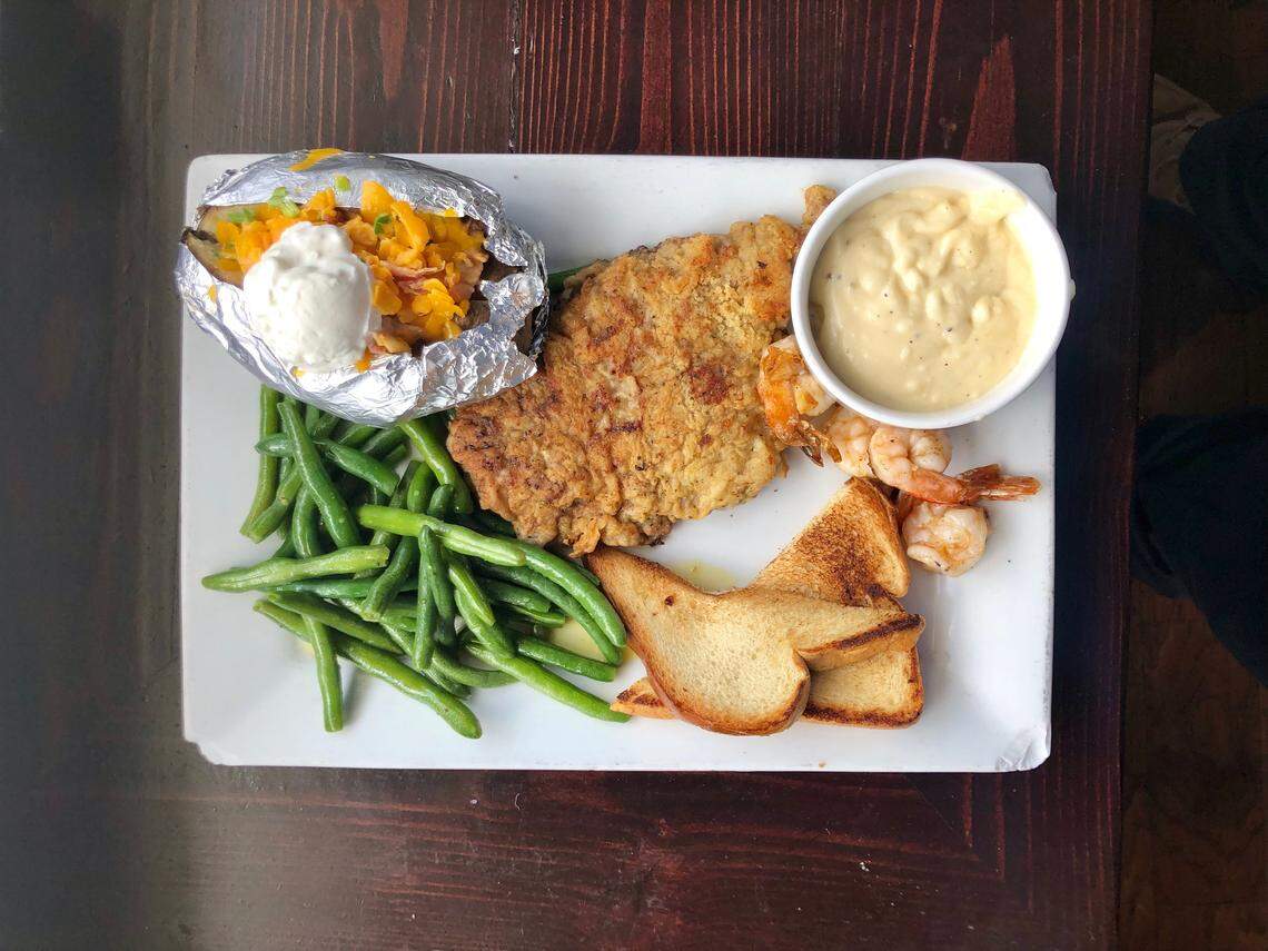 The Oasis at Joe Pool serves a West Texas-style chicken-fried steak with a light flour breading.