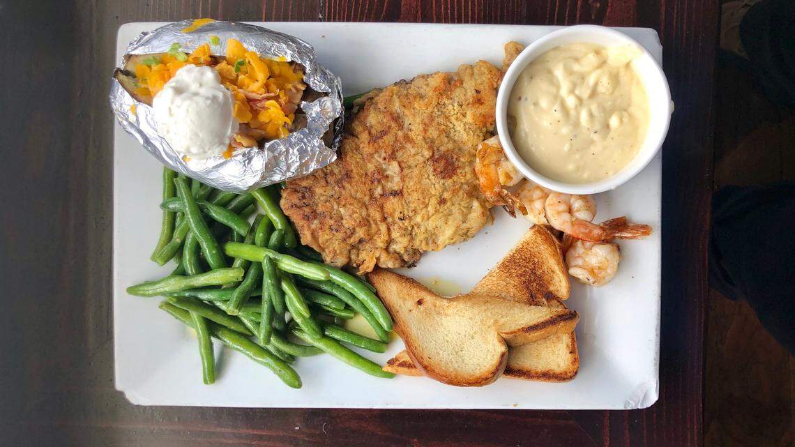 The Oasis at Joe Pool serves a West Texas-style chicken-fried steak with a light flour breading.
