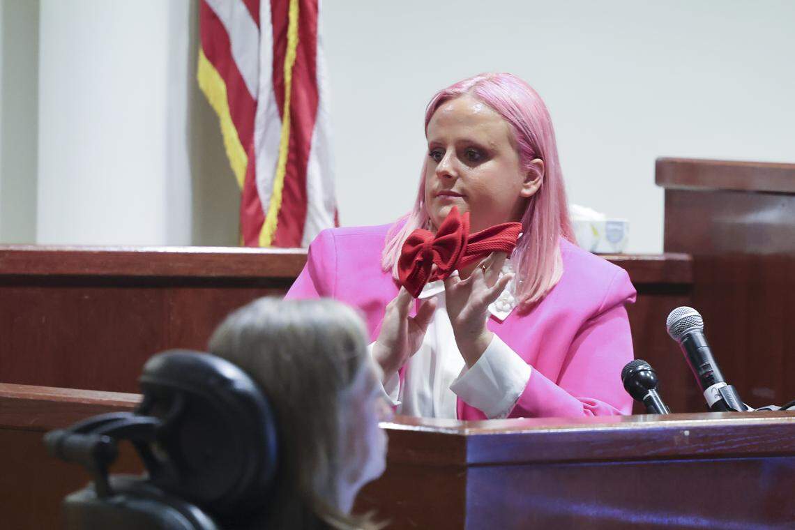 Maitlyn Gandy, mother of Athena Strand, shows a bow belonging to her daughter to the jury while testifying during the capital murder trial of Tanner Horner on Wednesday, April 15, 2026 in Fort Worth.