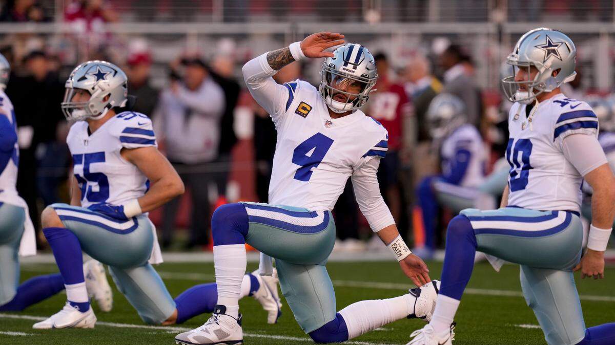 The Dallas Cowboys have restructured the contracts of quarterback Dak Prescott (4) and guard Zack Martin, clearly roughly 30 million cap room.