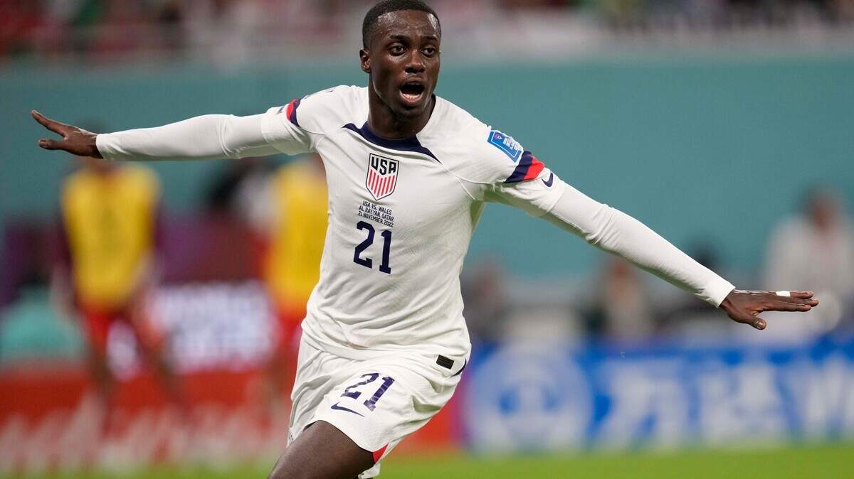 Tim Weah of the United States, celebrates after scoring during the World Cup, group B soccer match between the United States and Wales, at the Ahmad Bin Ali Stadium in in Doha, Qatar, on Monday.