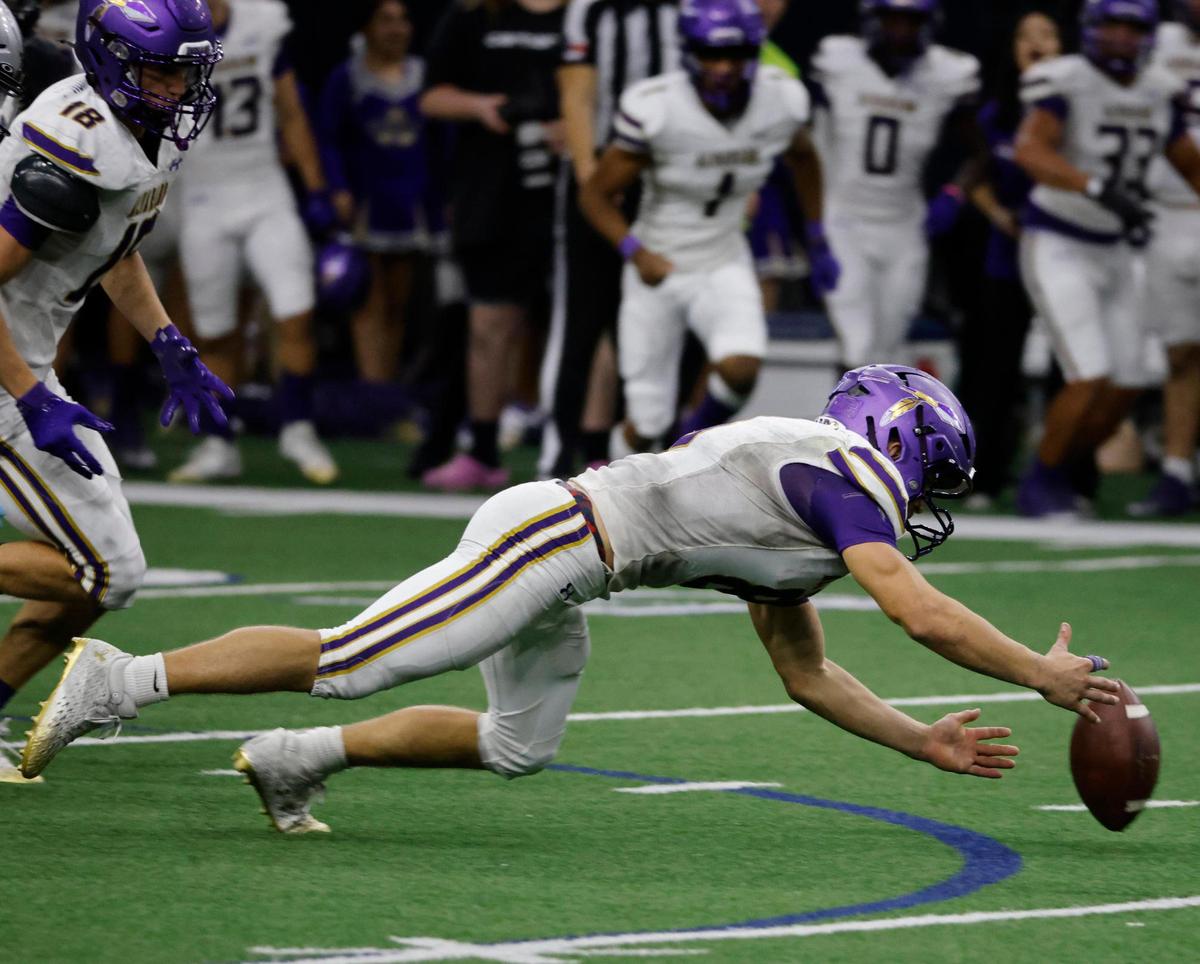 Alvarado running back D.J. Clampitt (8) recovers an onside kick during a UIL 4A D1 Area round football playoff game at The Ford Center in Frisco Texas, Thursday, Nov. 21, 2024.