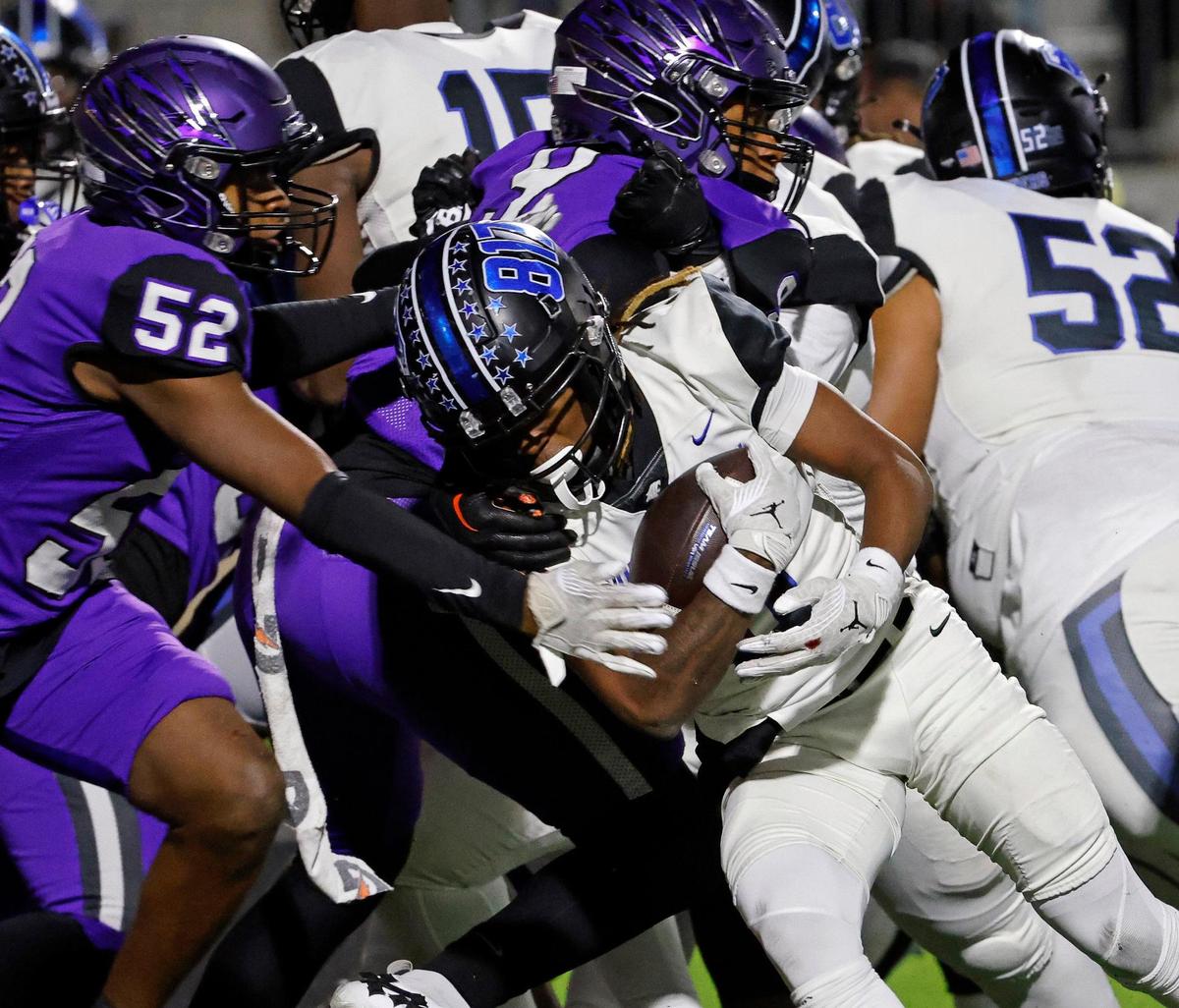 North Crowley wide receiver LaMarcus Davis (6) pushes his way in for a score in the first half of a UIL high school football game at Crowley ISD Multi-Purpose Stadium in Fort Worth, Texas, Thursday, Nov. 02, 2023.
