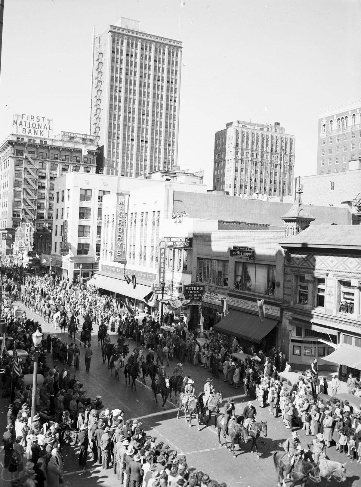 March 8, 1946: Crowds line downtown’s Main and Houston streets for the Southwestern Exposition and Fat Stock Show Parade. “Although the crowds were well behaved it took every effort on the part of police along the line of march to keep the streets open. The view was taken at Ninth and Houston streets.”