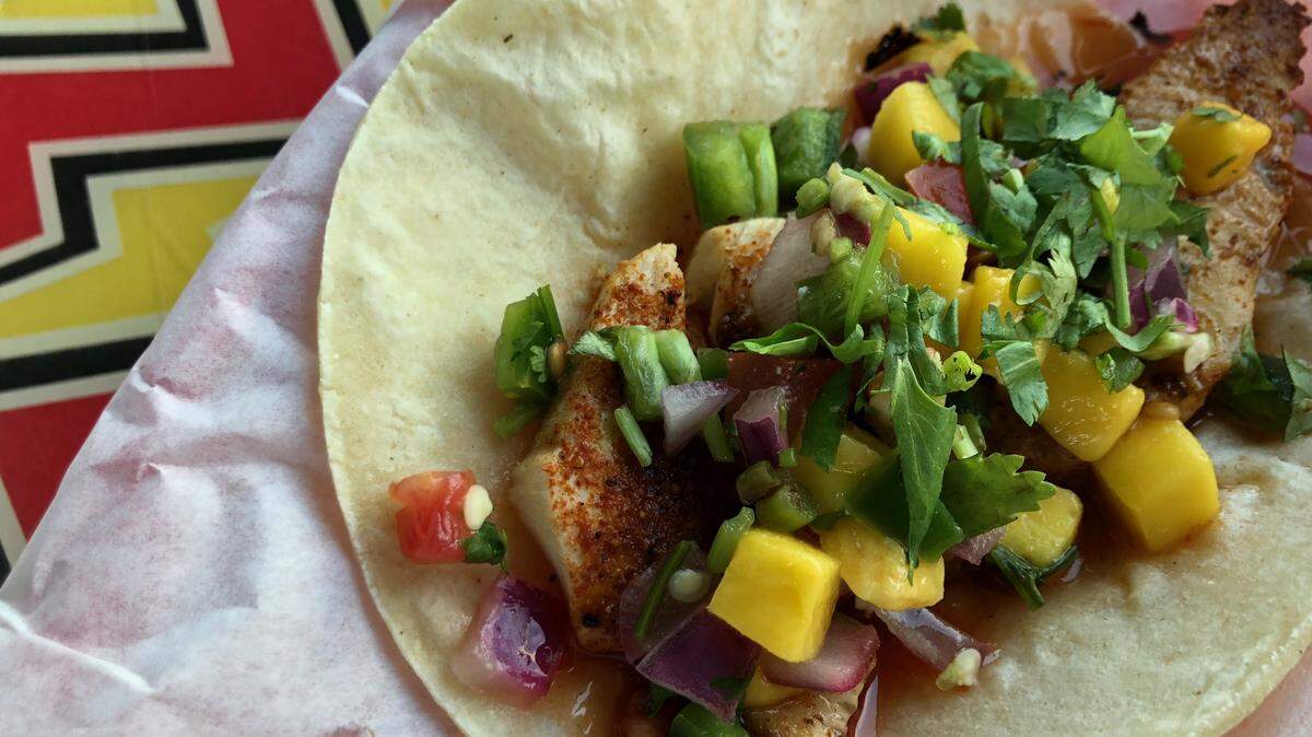 A mango-habanero mahi-mahi taco at Fuzzy’s Taco Shop.