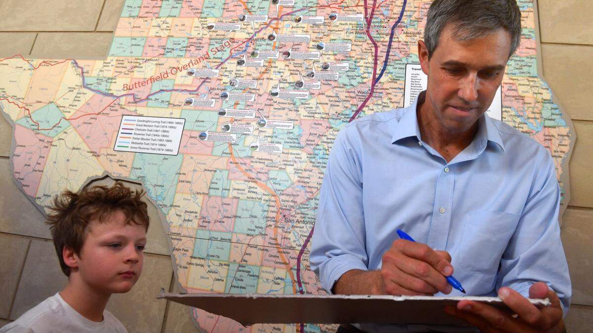 Texas Democratic candidate for governor Beto O’Rourke autographs a campaign sign for Mayer Richardson during O’Rourke’s Get Out The Vote rally at Frontier Texas! In Abilene Oct. 21, 2022.