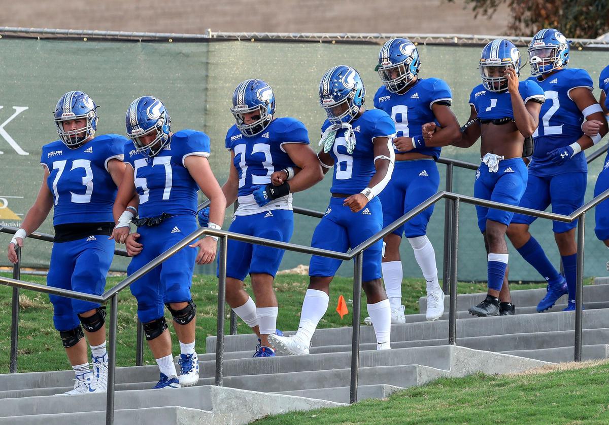 The Fort Worth Nolan Catholic Vikings walk down the steps to face the Celina Bobcats, Friday night, September 13, 2019 play at Doskocil Stadium in Fort Worth, TX.