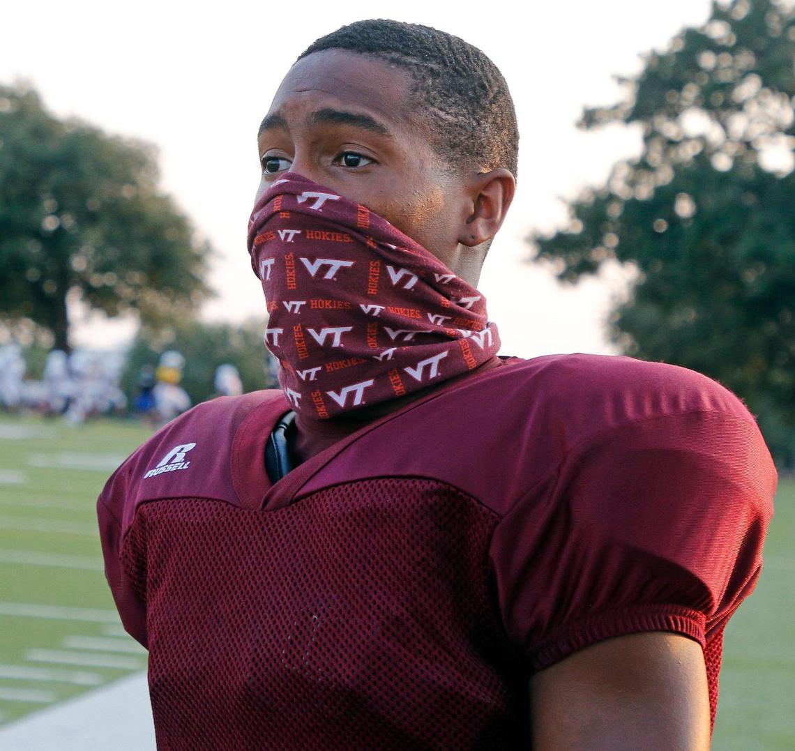 Virginia Tech three-star commit and North Side wide receiver Da’Wain Lofton watches as they play Southwest Christian School in a varsity scrimmage Thursday at North Side High School in Fort Worth.