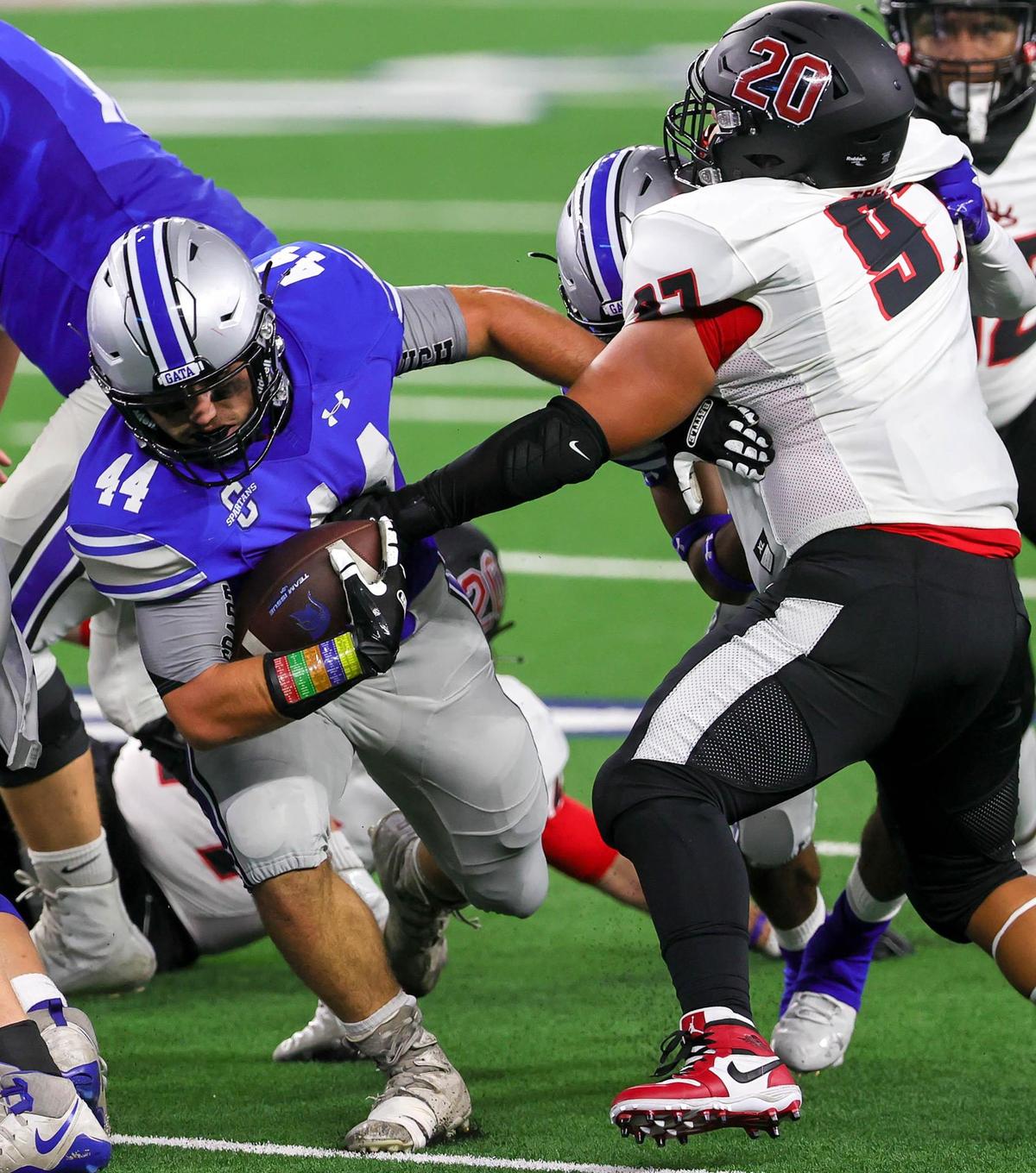 Centennial running back Christian Hudson (44) fights for yardage against Burleson during the first half, Thursday night, September 24, 2020 played at AT&T Stadium in Arlington, TX. (Steve Nurenberg Special to the Star-Telegram)