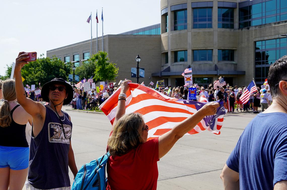 Protesters gather for the “No Kings Day” protest on June 14, 2025 in Arlington.