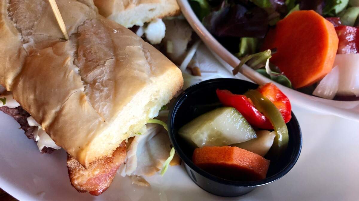 The Eastsider sandwich features roast beef, turkey and bacon in the Post at River East