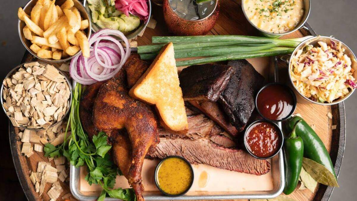 Barrel & Bones Craft Bar and Smokehouse is set to open by late August or early September in Montgomery Plaza.
