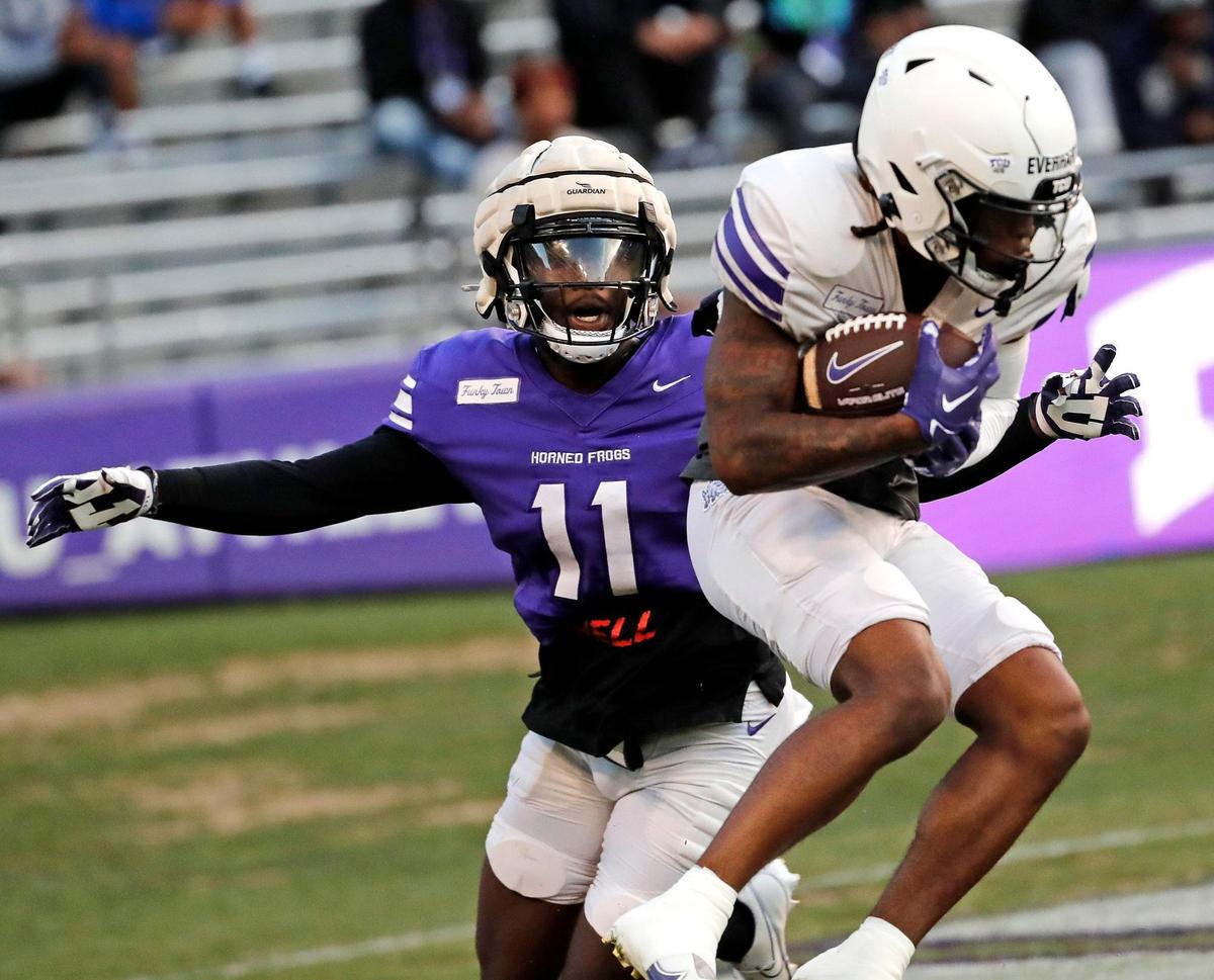 TCU wide receiver Major Everhart (22) grabs a touchdown pass in front of safety Chace Biddle (11) during the TCU Spring Game at Amon G. Carter Stadium in Fort Worth, Texas, Friday, Apr. 14, 2023. (Special to the Star-Telegram Bob Booth)