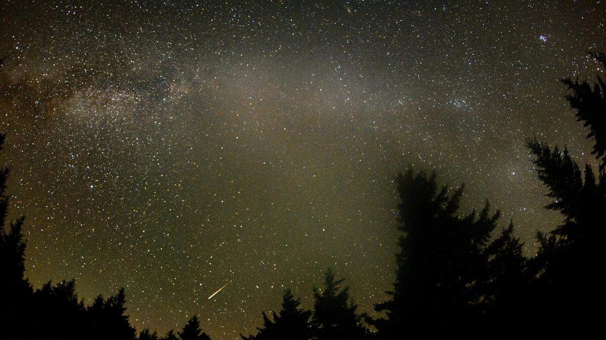 The Perseid meteor shower occurs when the Earth passes through debris that was left behind by Comet Swift-Tuttle.