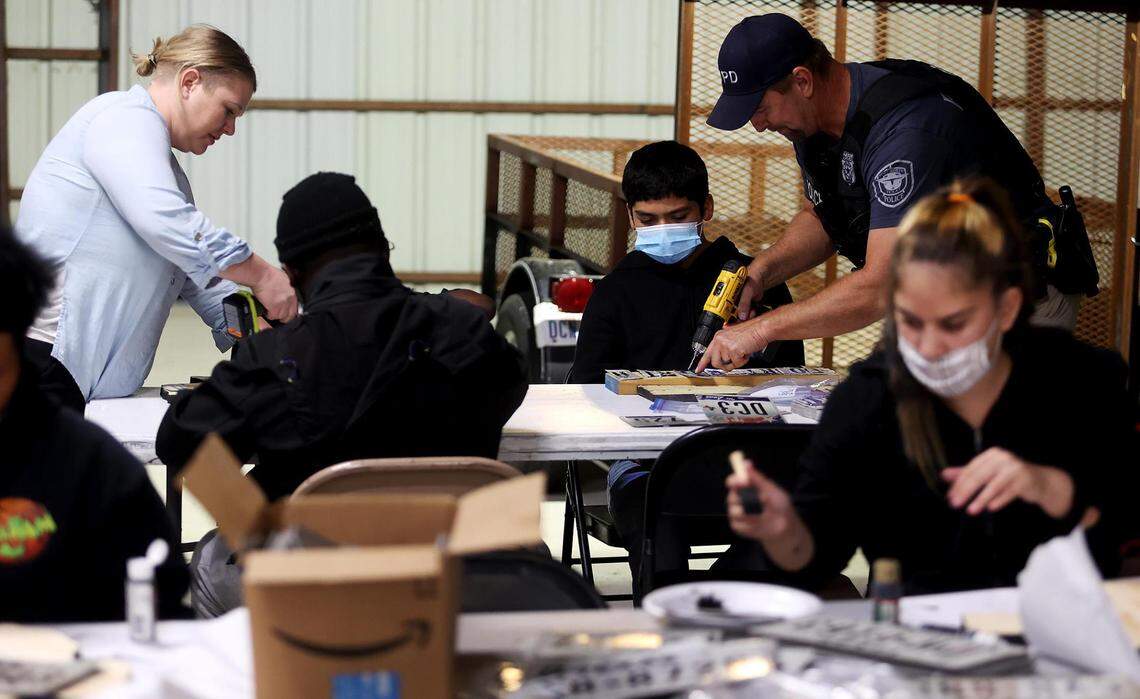 Teenagers staying at the Presbyterian Night Shelter attend Project Success on Tuesday, November 16, 2021, at Art of Living in Fort Worth. Project Success is a program where Fort Worth Police Department members and volunteers mentor unsheltered youth and work on art projects.