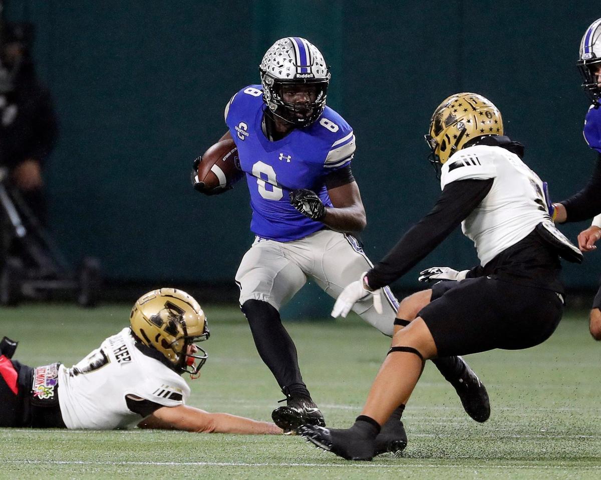 Burleson Centennial running back Jahiem Ababio (8) finds a hole in the line in the first half of Class 5A D1 regional semi-finals football game at Choctaw Stadium in Arlington, Texas, Friday, Nov. 25, 2022. (Special to the Star-Telegram Bob Booth)