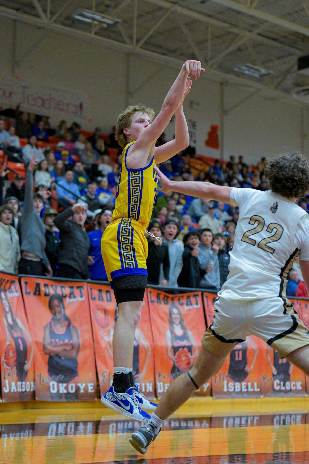 Brock’s Cale Pogue shoots over Fort Worth Eagle Mountain’s Matthew Neill in a Class 4A Division 2 area-round game on Thursday, February 20, 2025 at Aledo High School in Aledo, Texas. Brock defeated Eagle Mountain 57-42.