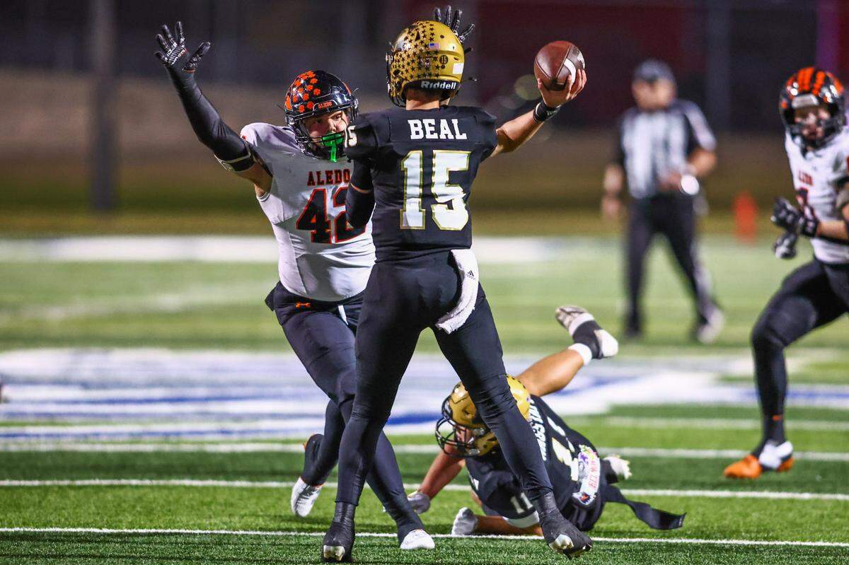 Aledo defensive end Cooper Cyphers pressure Abilene quarterback Tristan Beal in the Friday, Nov. 22 playoff game at Newsom Stadium in Mansfield. Special to the Star-Telegram / Tom Marvin