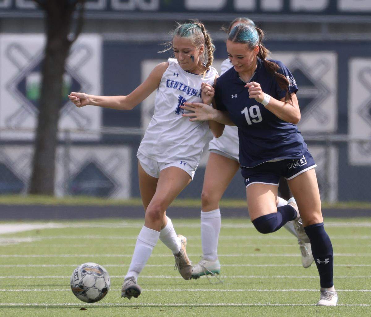 Burleson Centennial forward Jayde Hudson (11) brings the ball down the pitch ahead of Prosper Walnut Grove midfielder Leah Edler (19) during the second half of a UIL Conference 5A Division I state semifinal soccer game at Keller ISD Athletic Complex in Keller, Tx. Friday, April 03, 2026.