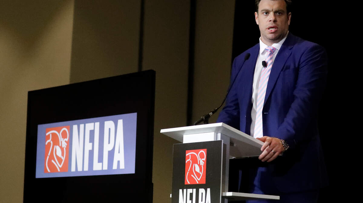 Eric Winston, president of the NFL Players Association, speaks at the annual state of the NFLPA press conference, in Miami Beach, Fla. NFL players narrolwly approved a new labor agreement with the league that features a 17-game regular season, higher salaries, increased roster sizes and larger pensions for current and former players.