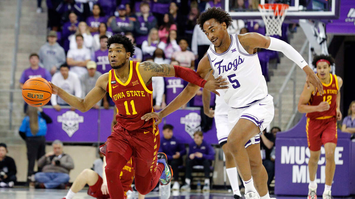 Iowa State guard Tyrese Hunter, left, drives as TCU forward Chuck O’Bannon Jr. chases during the first half of Tuesday’s Big 12 game at Schollmaier Arena. The Horned Frogs fell 54-51 to drop to 5-6 in Big 12 play.
