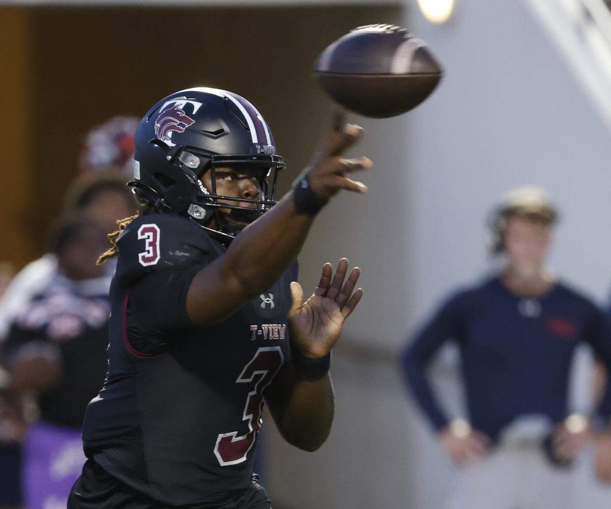 Timberview quarterback Mylez Davis (3) passes to the flat during the first half of a UIL football game at Vernon Newsom Stadium in Mansfield, Texas, Thursday, Sept. 04, 2025.