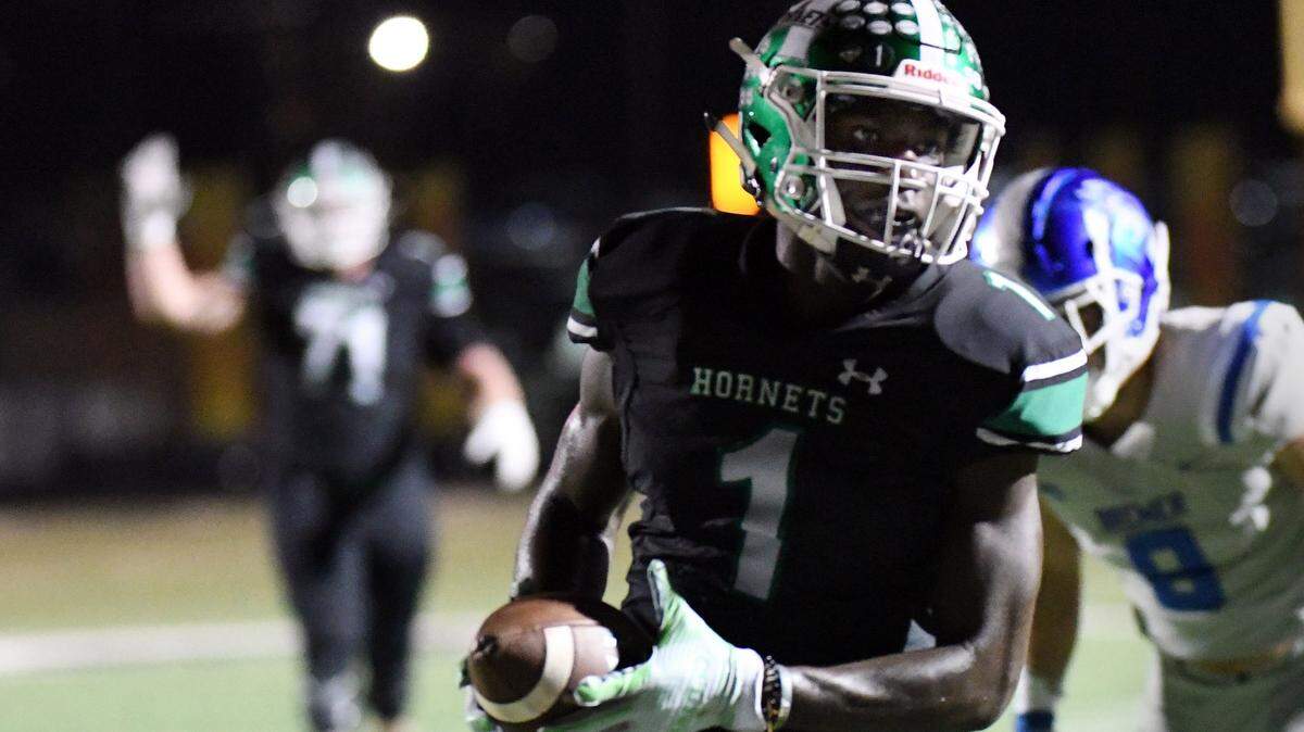 Azle’s Bernock Iya and the Hornets defeated Justin Northwest in Week 11 to clinch a share of the district title. Special/Bob Haynes