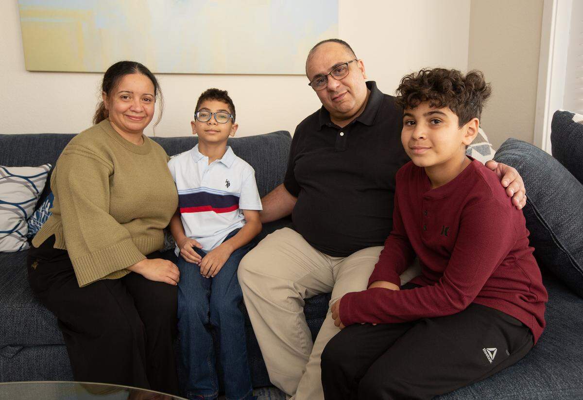 (From left to right) Sihem Messiad, Ryan Ben Alaya, Hakim Ben Alaya and Mazen Ben Alaya in their apartment in North Richland Hills on Tuesday, Dec. 16, 2025.