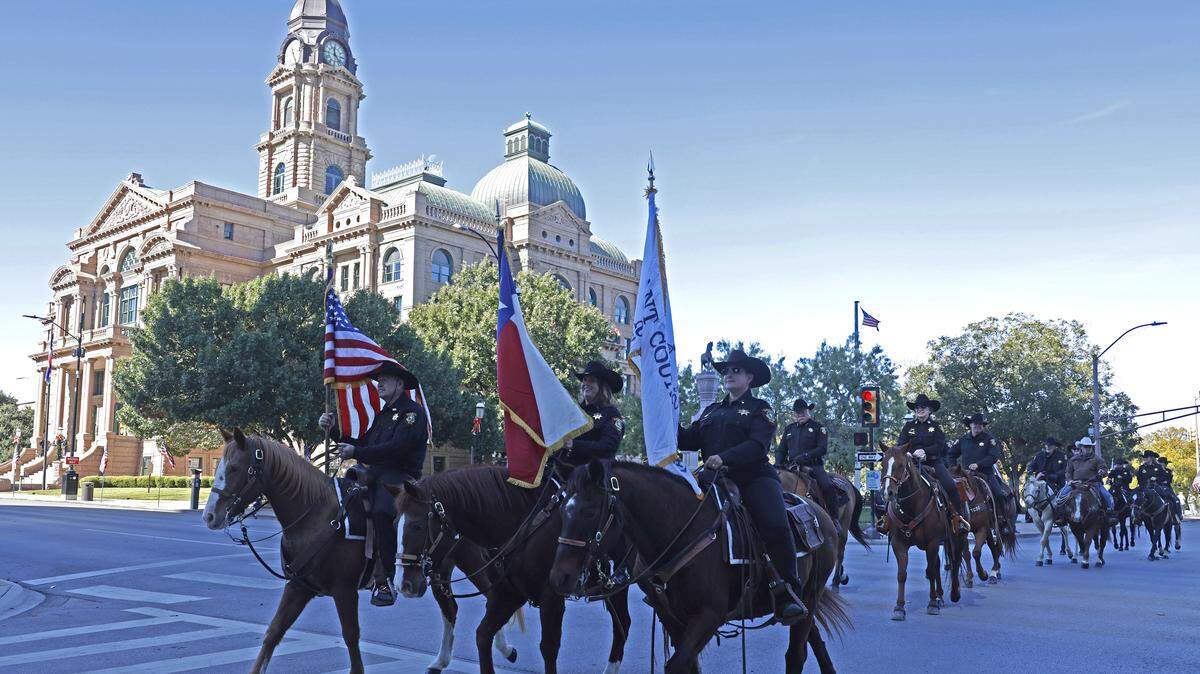 The Tarrant County Sheriffs posse passes the court house during the 2025 Tarrant County Veterans Day Parade Saluting Vietnam Veterans in Fort Worth, Texas, Tuesday Nov. 11, 2025.
