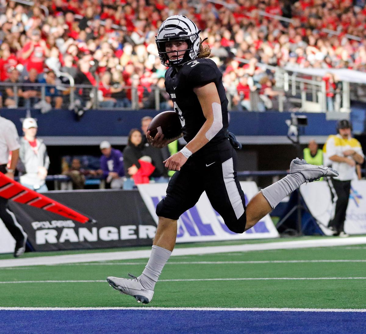 Offensive and defensive MVP of the game Grandview quarterback/free safety Dane Jentsch (3) scores another touchdown during the second quarter of a conference 3A division I State Championship football game at AT&T in Arlington, Texas, Thursday, Dec. 19, 2019. Grandview led 28-21 at the intermission. (Special to the Star-Telegram Bob Booth)