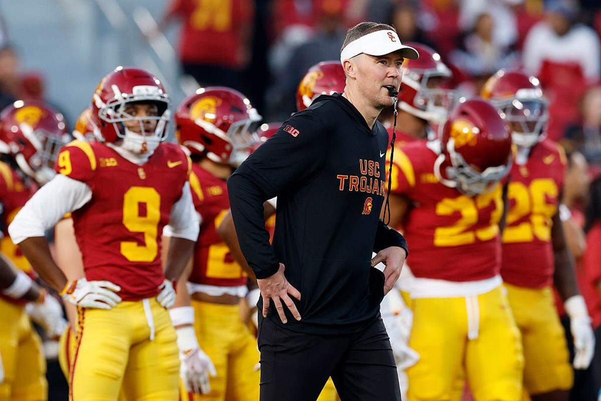 LOS ANGELES, CALIFORNIA - NOVEMBER 29: Head coach Lincoln Riley of the USC Trojans looks on prior to a game against the UCLA Bruins at Los Angeles Memorial Coliseum on November 29, 2025 in Los Angeles, California. (Photo by Harry How/Getty Images)