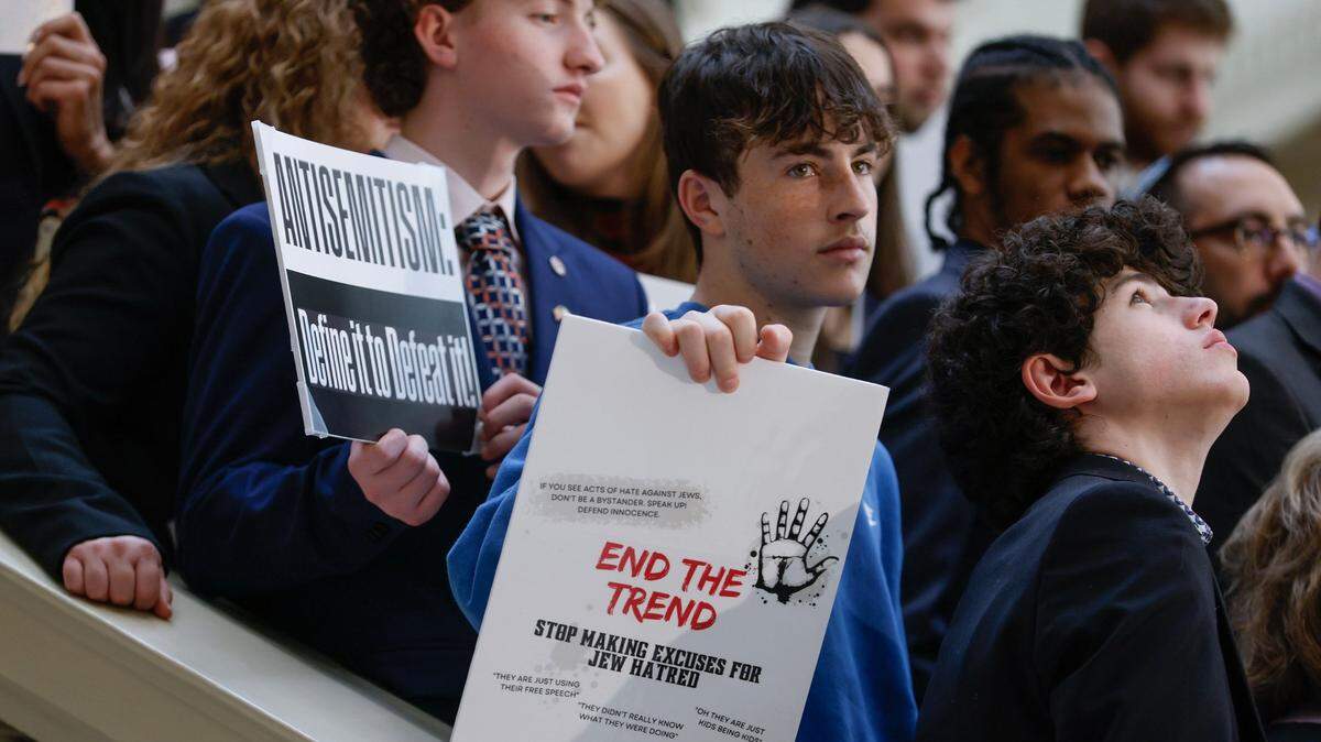 Members of the Jewish community and supporters hold signs during an antisemitism press conference at the Georgia State Capitol on Wednesday, Feb. 22, 2023. (Natrice Miller/The Atlanta Journal-Constitution/TNS)