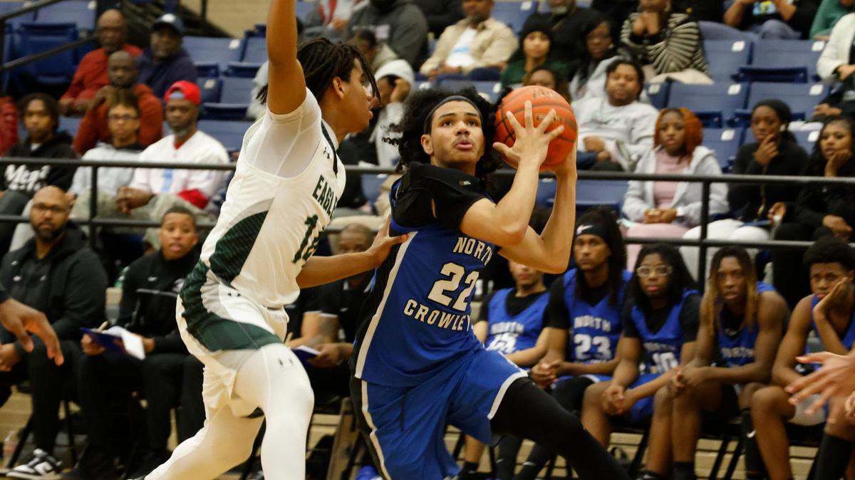 North Crowley guard Isaak Hayes (22) prepares to get a shot off during a game Jan. 24, 2025, at Mansfield Lake Ridge.