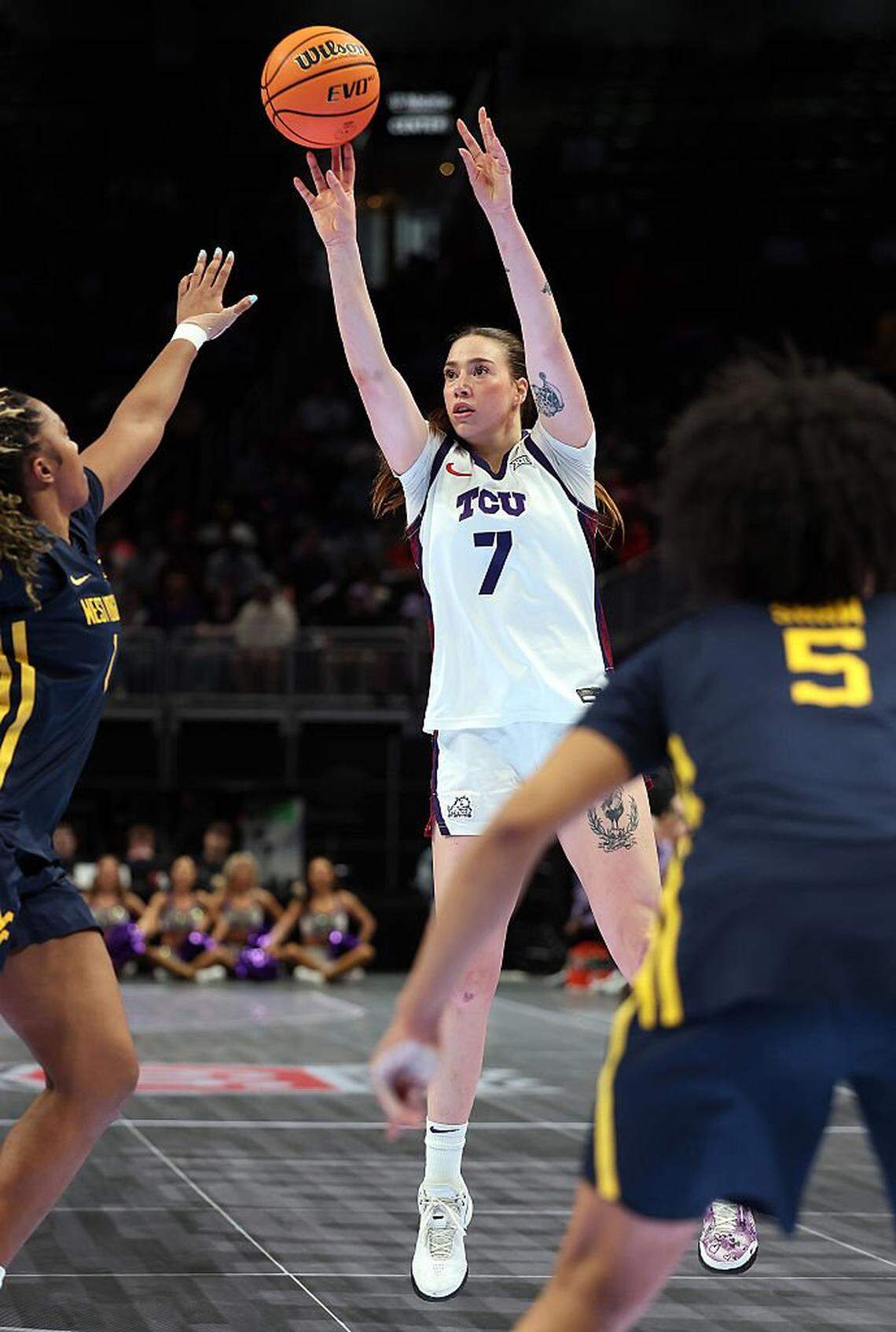 KANSAS CITY, MISSOURI - MARCH 08: Marta Suarez #7 of the TCU Horned Frogs shoots over Gia Cooke #3 of the West Virginia Mountaineers during the championship game of the 2026 Big 12 Women's Tournament at T-Mobile Center on March 08, 2026 in Kansas City, Missouri. (Photo by Jamie Squire/Getty Images)