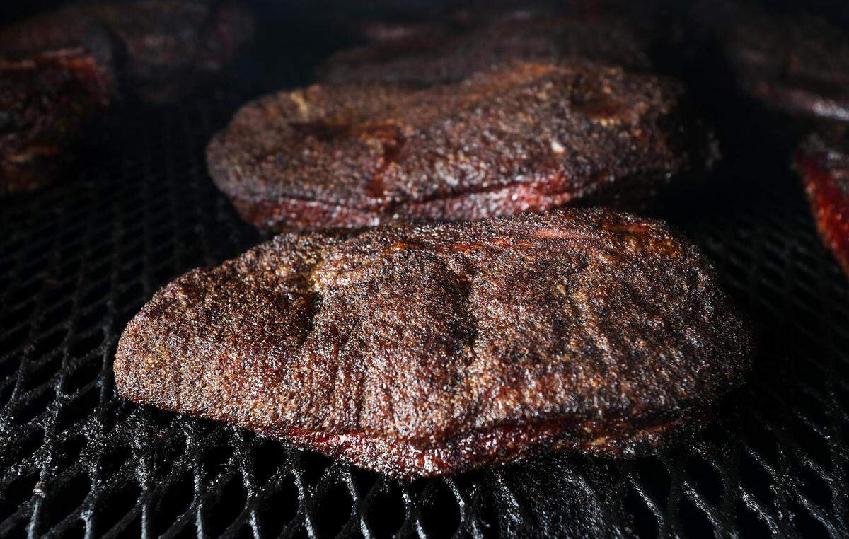 Briskets cook inside GoldeeÕs smokers on Friday, October 15, 2021, in Kennedale.
