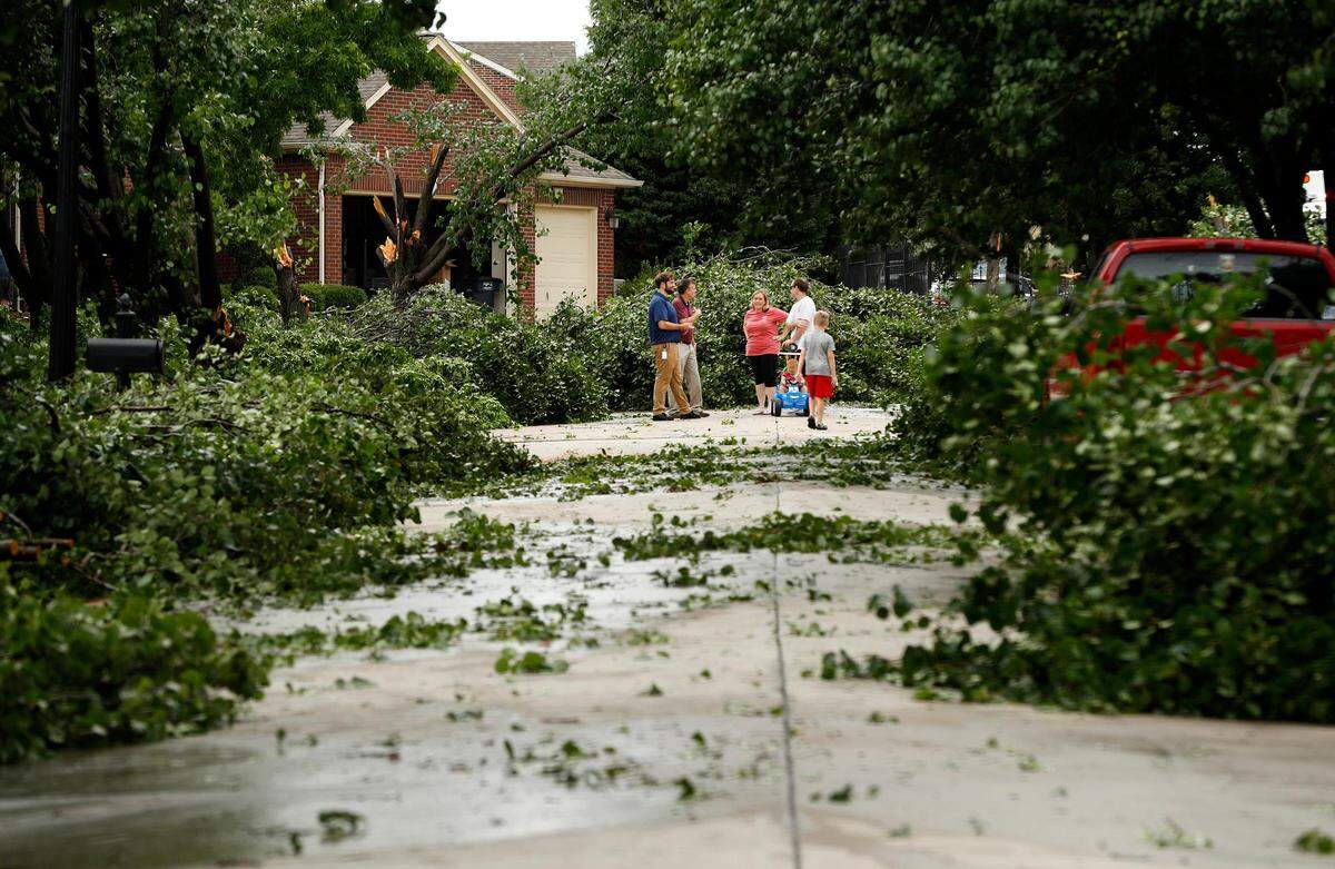 Downed trees line Pendleton Drive in the Heritage neighborhood of Fort Worth on Wednesday, May 29, 2019. Severe storms with strong winds moved through the Fort Worth area Wednesday afternoon.