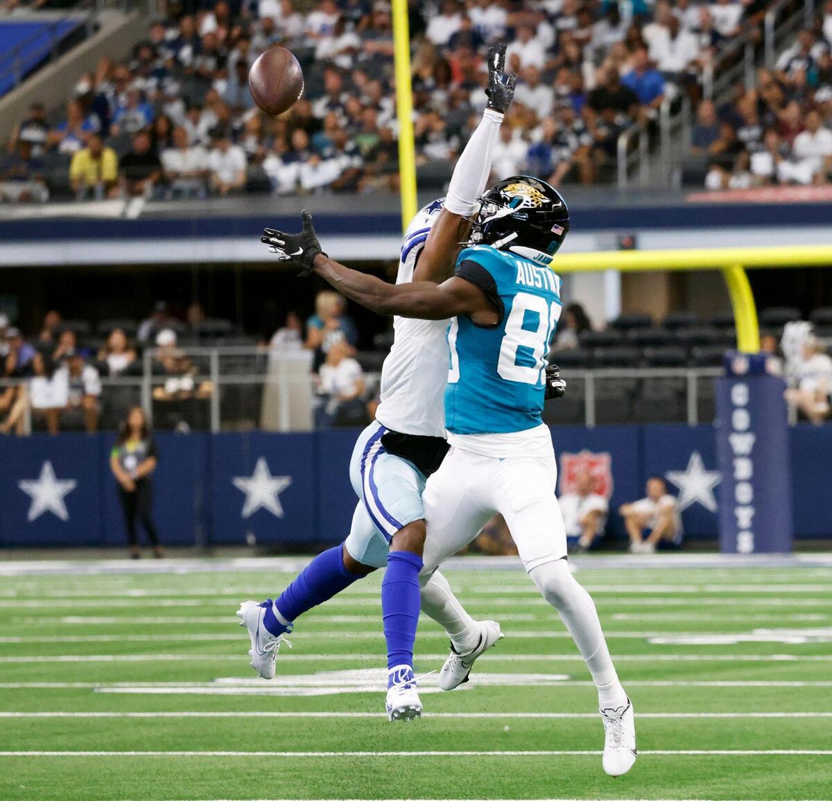 Dallas Cowboys cornerback Nahshon Wright breaks up a pass intended for Jacksonville Jaguars wide receiver Kevin Austin Jr. on Saturday, August 12, 2023, at AT&T Stadium in Arlington.