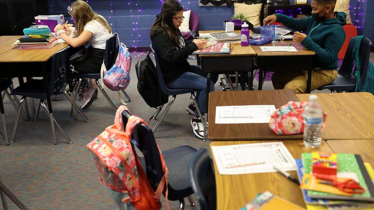 Fifth-graders during the first day of school at Townley Elementary in August. Starting at age 11, kids should receive two doses of the meningococcal vaccine, which can protect against a disease that can cause blood and brain infections.