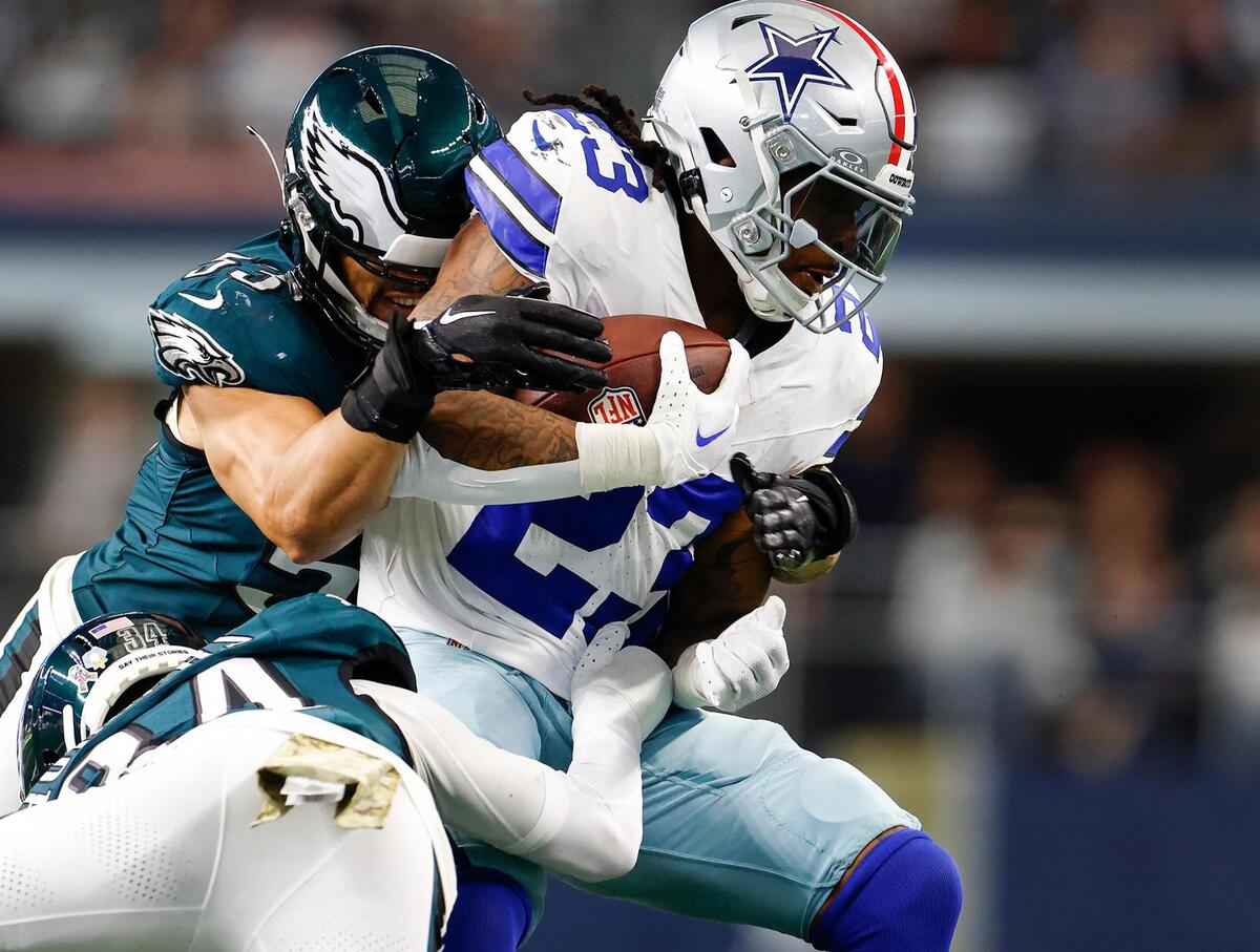Dallas Cowboys running back Rico Dowdle is tackled by the Philadelphia Eagles on Nov. 10, 2024. The Cowboys running game ranks last in the NFL.