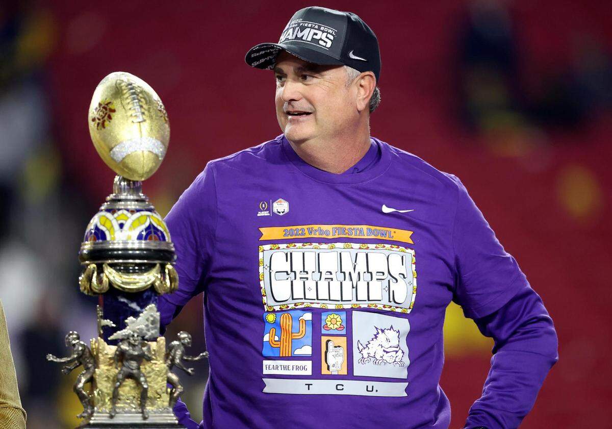 TCU head coach Sonny Dykes waits to receive the Fiesta Bowl trophy after defeating Michigan in the CFP semifinal at State Farm Stadium in Glendale, Ariz., on Saturday, December 31, 2022.