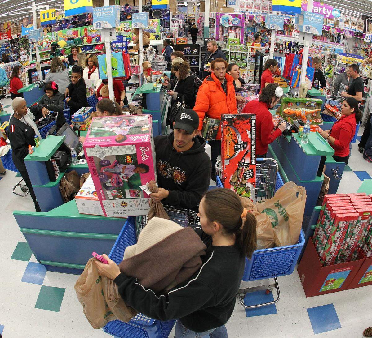 2011: The crush at the checkout line for Black Friday deals on Thanksgiving, as a huge throng of shoppers start their holiday shopping at Toys R Us in Hurst.