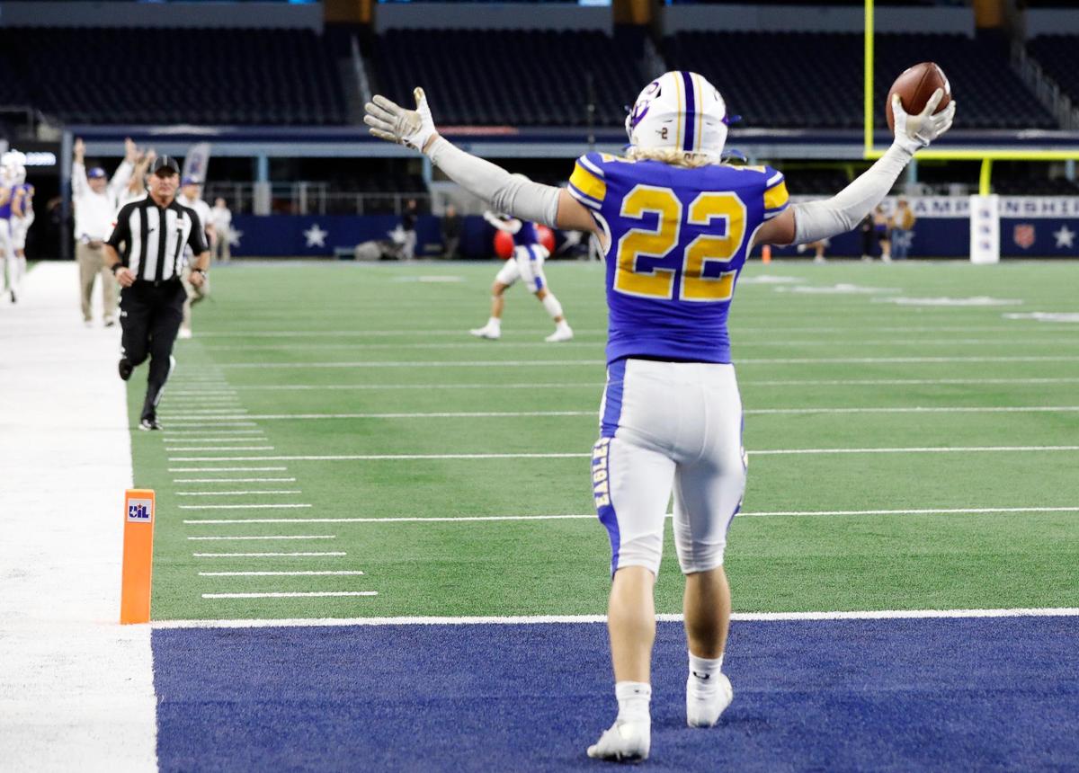Brock running back Brett Tutter (22) celebrates his touchdown in the second half of a UIL Class 3A D2 state championship football game at AT&T Stadium in Arlington, Texas, Thursday , Dec. 15, 2022. Franklin defeated Brock 17-14 as the clock ran out. (Star-Telegram Bob Booth)