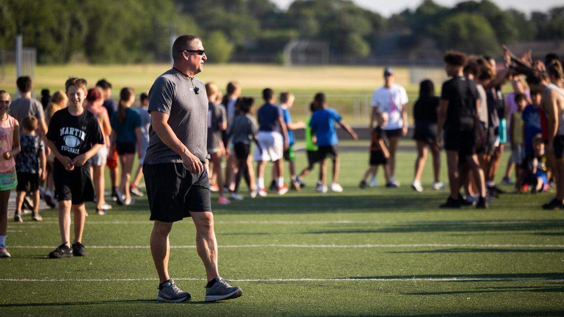 Arlington Martin football coach Bob Wager, working a summer camp in June, says his school is fully staffed with coaches.