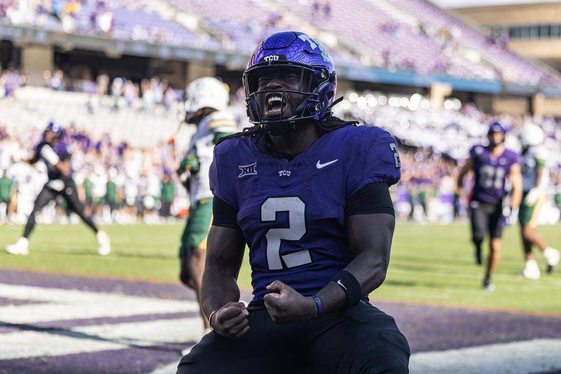 TCU running back Kevorian Barnes (2) celebrates after rushing in for a touchdown in the second half of a Big XII football game between the TCU Horned Frogs and the Baylor Bears at Amon G Carter Stadium in Fort Worth on Saturday, Oct. 18, 2025.