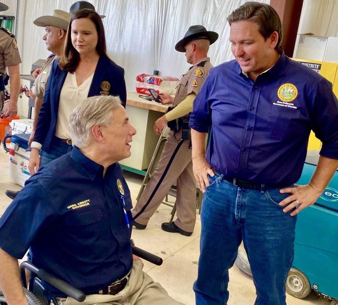 Florida Gov. Ron DeSantis and Texas Gov. Greg Abbott visit Del Rio, Texas, July 17, 2021, in a photo published by Abbott’s campaign.